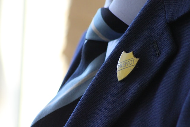 yellow sign on school uniform
