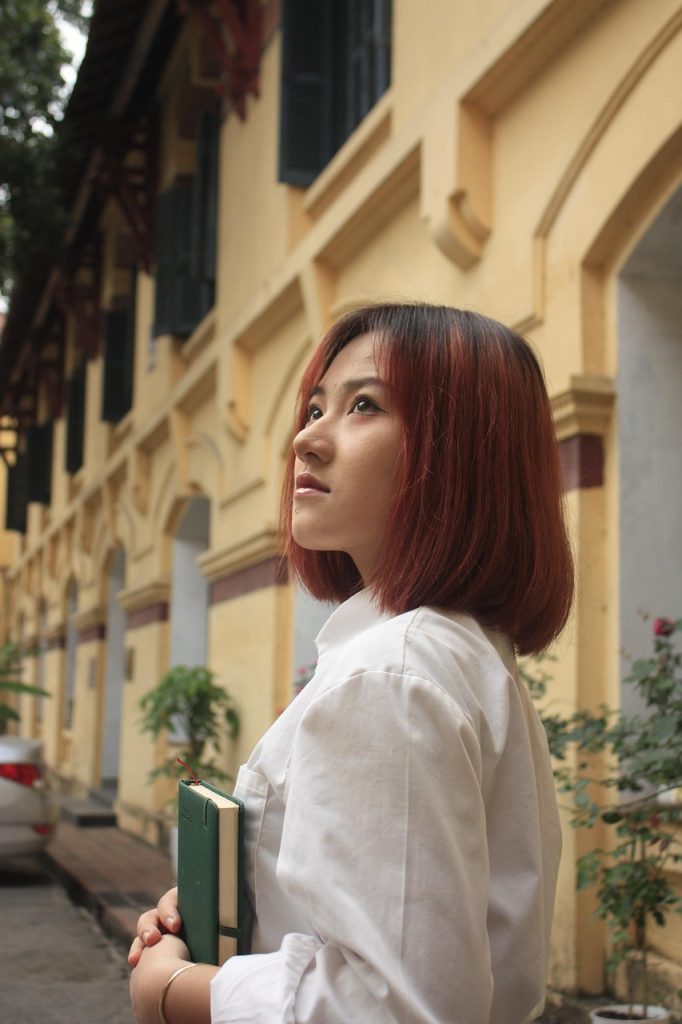 woman-student-book-campus-school